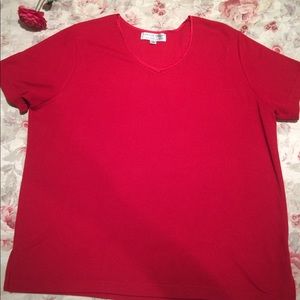 Used red shirt for women. In good condition.